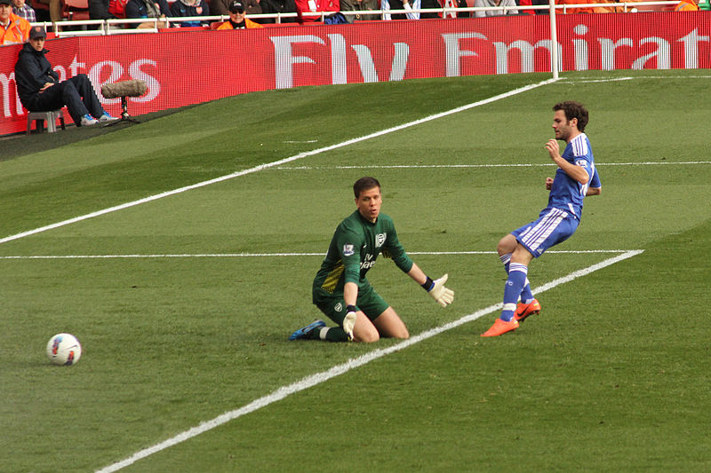 Juan Mata casuakky making a mere mortal look stupid, as he often does. The meanie.